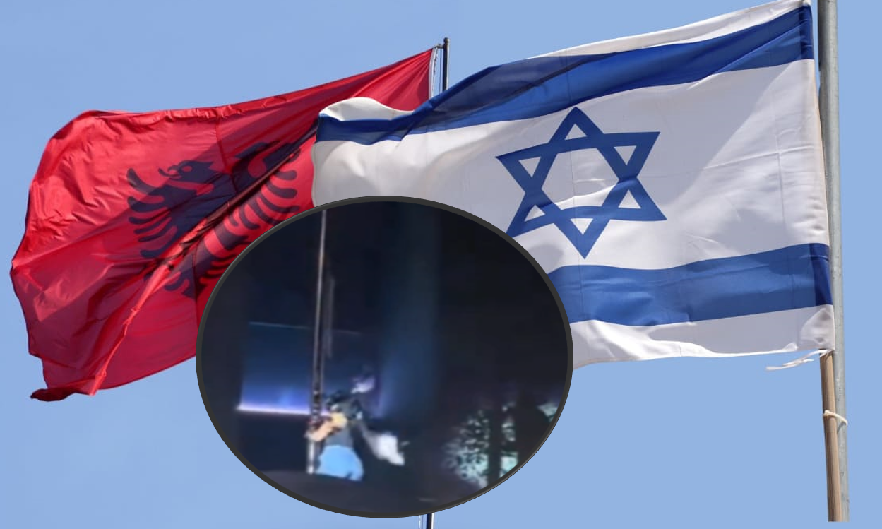 Dalin pamjet e incidentit  një vajzë me maskë shkul flamurin e Izraelit te ambasada në Tiranë