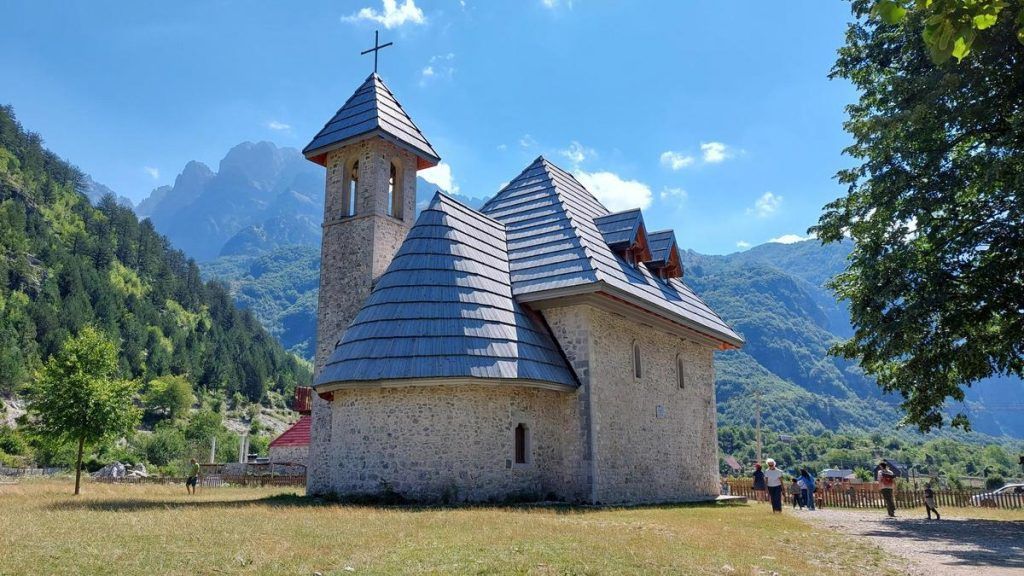 e një